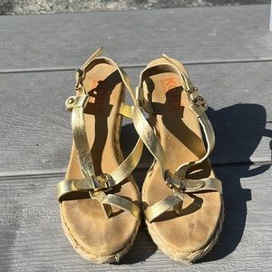Michael Kors gold wedge